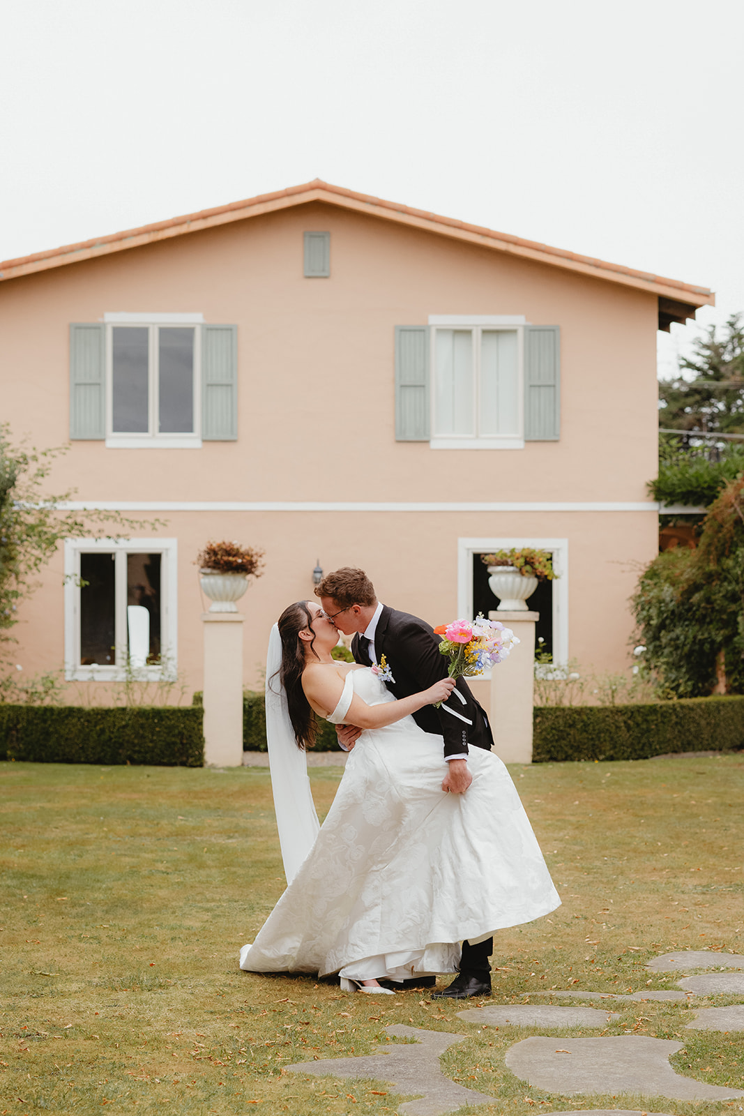Zoe and Byron outside Villa Candotti during their wedding portraits.